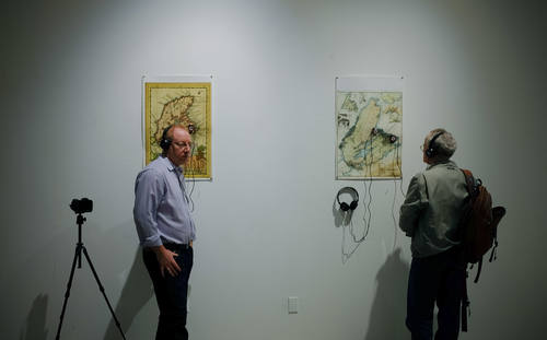 Former Jewish residents of Cape Breton Island joined by Dr Randall Schnoor listen to CBC broadcasts, soundscapes, and interview clips as part of the multimedia maps installed during the Jewish Life on Cape Breton Island Exhibit at York university in May 2014.