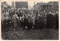 Mission and missionary father in the early 1950's. Father Zarsky far left.