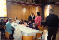 Photograph of children making pysanky