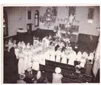 Holy Communion at Holy Ghost Ukrainian Catholic Parish. Note: on the back it says "another month of May (Mary Month)”