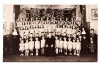 Photograph early 1940s in the Old Church Hall. Photograph of children with Father Zasky and Sister Martha (Bohoychuk).