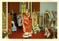 Photograph of service at Holy Ghost Ukrainian Catholic Parish. Father Zarsky giving sermon.