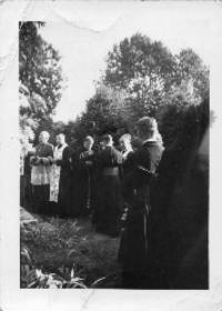 Photograph of priests at event. On the back, Photograph was taken on August 31/47 near the O.L.S in Ancaster taken by Wates Verbecky