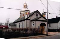 Photograph of exterior of the Holy Ghost Ukrainian Catholic Parish facing west.