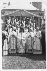 Photograph of a group of priests and bishop, Fr. Zarsky right.