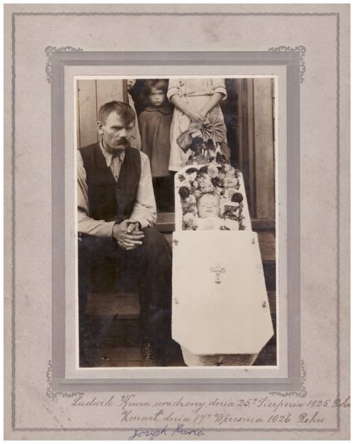 Photograph of child in coffin. Caption reads: 'Ludwik Kuna, born August 25, 1925, died September, 1926.' Signed by Joseph Kuna.