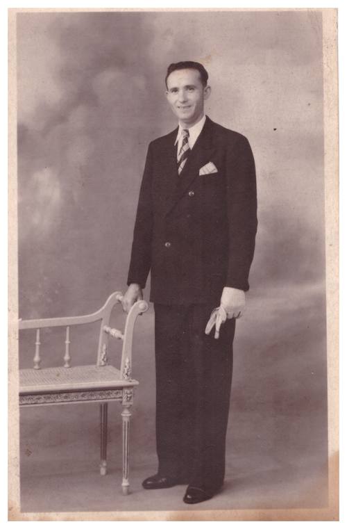 Photograph of man, the back is in Polish, something about ‘8 years’.