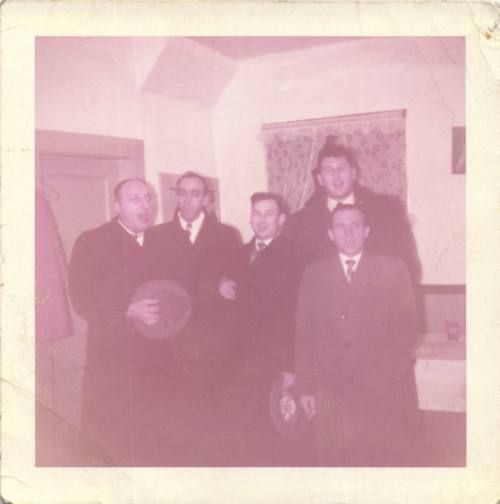 Male carollers at a house on Christmas (Julian Calendar)